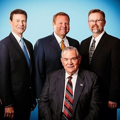 four members of Hewlett family syanding